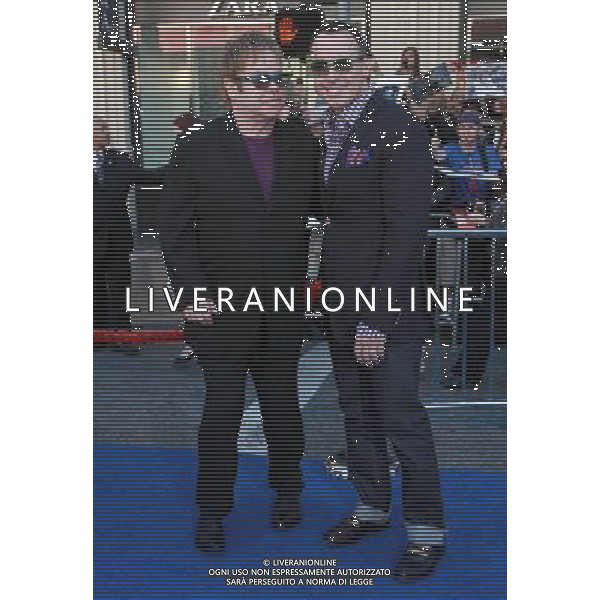 23 January 2011 - Hollywood, CA - Elton John and David Furnish. Gnomeo And Juliette World Premiere held At The El Capitan Theatre. Photo Credit: Kevan Brooks/AdMedia AG. ALDO LIVERANI SAS ITALY ONLY