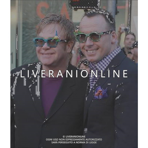 23 January 2011 - Hollywood, CA - Elton John and David Furnish. Gnomeo And Juliette World Premiere held At The El Capitan Theatre. Photo Credit: Kevan Brooks/AdMedia AG. ALDO LIVERANI SAS ITALY ONLY