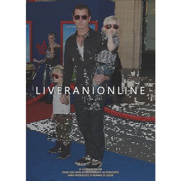 23 January 2011 - Hollywood, CA - Gavin Rossdale and sons Kingston Rossdale and Zuma Rossdale. Gnomeo And Juliette World Premiere held At The El Capitan Theatre. Photo Credit: Kevan Brooks/AdMedia AG. ALDO LIVERANI SAS ITALY ONLY