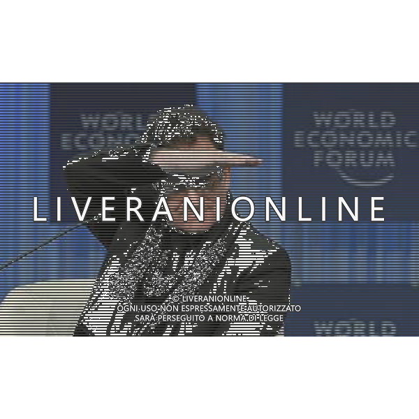 DAVOS/SWITZERLAND, 28JAN11 - Bono, Lead Singer of U2 and Co-Founder, ONE campaign and (RED), ONE, United Kingdom, gestures during the session \'Polio: Eradicating an Old Reality Once and for All\' at the Annual Meeting 2011 of the World Economic Forum in Davos, Switzerland, January 28, 2011. World Economic Forum Moritz Hager ©PHOTOSHOT/Agenzia Aldo Liverani Sas - ITALY ONLY - EDITORIAL USE ONLY -