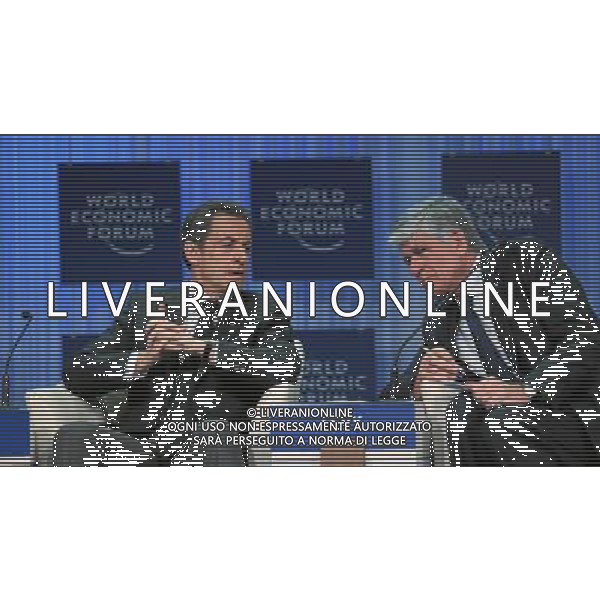 (110127) -- DAVOS, Jan. 27, 2011 () -- French President Nicolas Sarkozy (L) speaks to Maurice Levy, Chairman and CEO of Publicis Groupe from France, during the session \'Vision for the G20\' at the Annual Meeting 2011 of the World Economic Forum in Davos, Switzerland, Jan. 27, 2011. (/World Economic Forum)(axy) ©PHOTOSHOT/Agenzia Aldo Liverani Sas - ITALY ONLY - EDITORIAL USE ONLY -