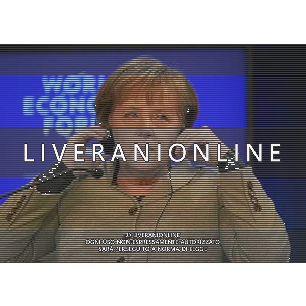 DAVOS/SWITZERLAND, 28JAN11 - Angela Merkel, Federal Chancellor of Germany listens during the session \'Revitalizing Global Trade\' at the Annual Meeting 2011 of the World Economic Forum in Davos, Switzerland, January 28, 2011. World Economic Forum ©PHOTOSHOT/Agenzia Aldo Liverani Sas - ITALY ONLY - EDITORIAL USE ONLY -