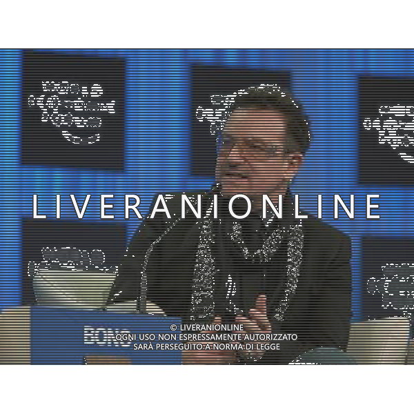 DAVOS/SWITZERLAND, 28JAN11 - Bono, Lead Singer of U2 and Co-Founder, ONE campaign and (RED), ONE, United Kingdom, is captured during the session \'Raising Healthy Children\' at the Annual Meeting 2011 of the World Economic Forum in Davos, Switzerland, January 28, 2011. World Economic Forum ©PHOTOSHOT/Agenzia Aldo Liverani Sas - ITALY ONLY - EDITORIAL USE ONLY -