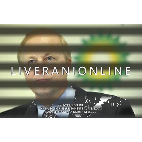 BP\'s chief executive, Robert Dudley speaking at a press conference in London this morning BP has released Q4 results this morning, reporting net income of $5.57 billion versus $4.3 billion last year. The company reported a full-year loss of $3.72 billion versus a profit of $16.58 billion in 2009. The group income statement for Q4 and full-year reflects a pre-tax charge of $1 billion and $40.9 billion respectively related to the Gulf of Mexico oil spill, with all charges relating to the incident have being treated as non-operating items. The company announced the resumption of quarterly dividend payments, with a 7c per share dividend to be paid on Mar. 28 this year. The company said that following a strategic review, it intends to divest the Texas City refinery and the southern part of its US West Coast Fuels Value Chain, including the Carson refinery, by the end of 2012 subject to all necessary legal and regulatory approvals, adding that it will ensure current obligations at Texas City are fulfilled. ©photoshot/Agenzia Aldo Liverani Sas - ITALY ONLY - Conferenza stampa dell\'Amministratore delegato di BP, Robert Dudley per relazionare la perdita annuale dopo i costi di sversamento di petrolio nel golfo del messico -Londra 01/02/2011