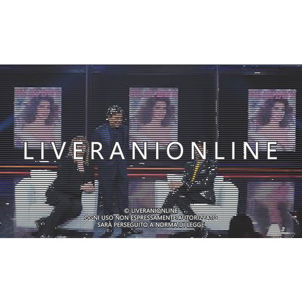 COLOGNO M.se (MI) 5/2/2011 STUDI TELEVISIVI DI MEDIASET TRASMISSIONE TELEVISIVA: -CHIAMBRETTI NIGHT- NELLA FOTO PIERO CHIAMBRETTI, IVA ZANICCHI E JONATHAN KASHANIAN E DIETRO LA COPERTINA DI IVA ZANICCHI SU PLAYBOY FOTO ROMANO/AG ALDO LIVERANI