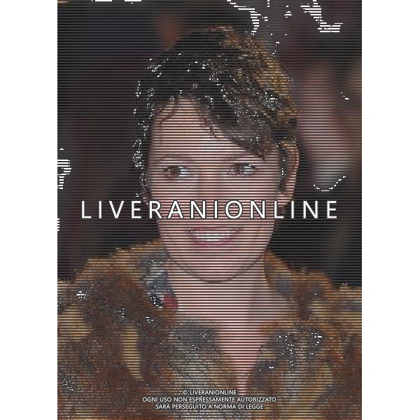 Picture Shows: Olivia Colman attending the World Premiere of Paul, Empire Leicester Square, London. 7th February 2011 AG. ALDO LIVERANI SAS ITALY ONLY *** Local Caption ***