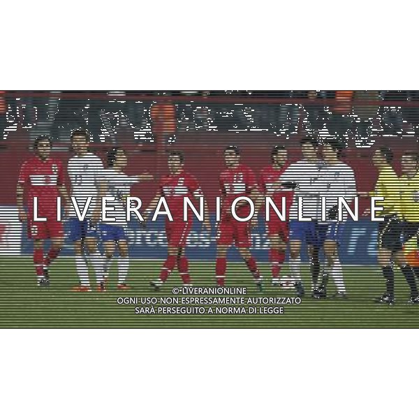 Friendly soccer match between Turkey and South Korea at Avni Aker Stadium in Trabzon, Turkey on February 09, 2011 match scored: Turkey 0 - South Korea 0 NELLA FOTO Selcuk Inan (L) and Emre Belozoglu ( center) and Ismail Koybasi (R) of Turkey FOT. SESKIM/NEWSPIX.PL /ALDO LIVERANI S A S ONLY ITALY 