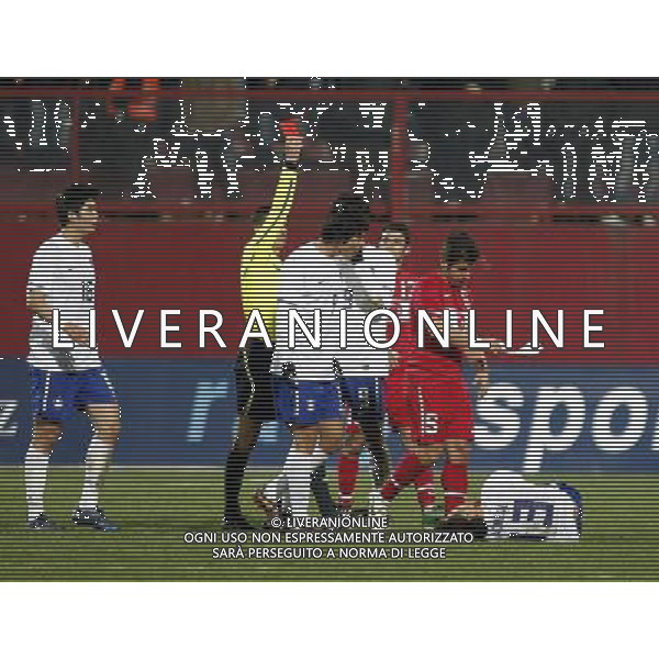 Friendly soccer match between Turkey and South Korea at Avni Aker Stadium in Trabzon, Turkey on February 09, 2011 match scored: Turkey 0 - South Korea 0 NELLA FOTO Emre Belozoglu (L) of Turkey and Ja Cheol Koo (R) of South Korea and referee Sergiy Boyko FOT. SESKIM/NEWSPIX.PL /ALDO LIVERANI S A S ONLY ITALY 