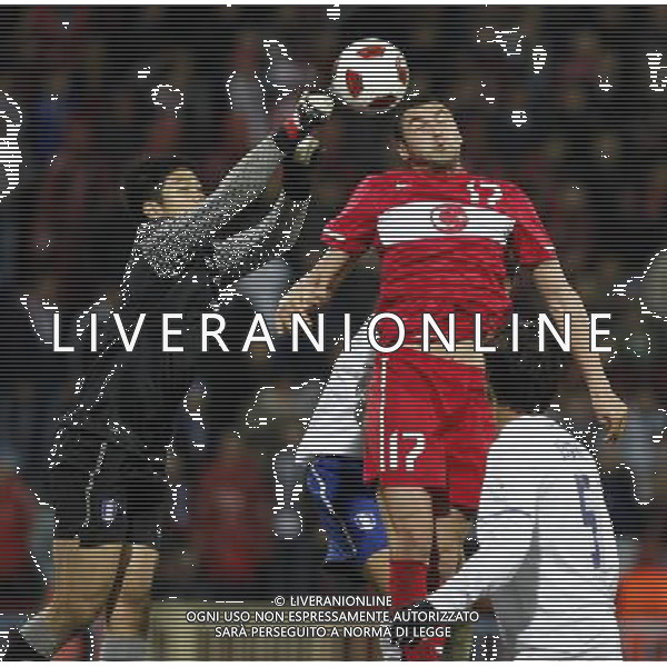 Friendly soccer match between Turkey and South Korea at Avni Aker Stadium in Trabzon, Turkey on February 09, 2011 match scored: Turkey 0 - South Korea 0 NELLA FOTO Goalkeeper Sung Ryong Jung of South Korea and Burak Yilmaz of Turkey FOT. SESKIM/NEWSPIX.PL /ALDO LIVERANI S A S ONLY ITALY 