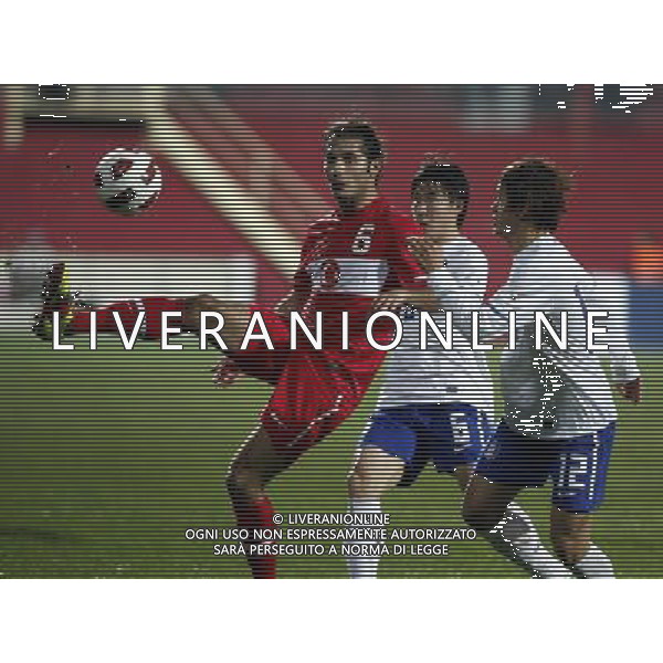 Friendly soccer match between Turkey and South Korea at Avni Aker Stadium in Trabzon, Turkey on February 09, 2011 match scored: Turkey 0 - South Korea 0 NELLA FOTO Hamit Altintop (L) of Turkey and Yong Rae Lee (center) Chul Hong (R) of South Korea FOT. SESKIM/NEWSPIX.PL /ALDO LIVERANI S A S ONLY ITALY 