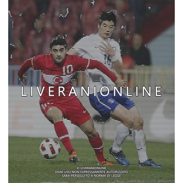 Friendly soccer match between Turkey and South Korea at Avni Aker Stadium in Trabzon, Turkey on February 09, 2011 match scored: Turkey 0 - South Korea 0 NELLA FOTO Mehmet Ekici (L) of Turkey and Sung Yueng Ki (R) of South Korea FOT. SESKIM/NEWSPIX.PL /ALDO LIVERANI S A S ONLY ITALY 