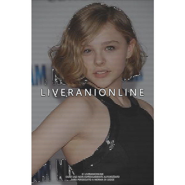 Chloe Moretz Photo by Janet Gough \'I Am Number Four\' World Premiere at the Village Theatre February 9, 2011 - Westwood, California AG. ALDO LIVERANI SAS ITALY ONLY
