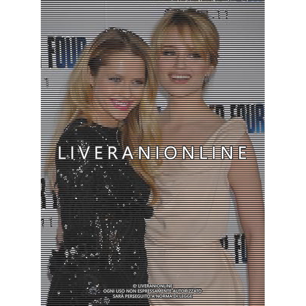 Teresa Palmer and Dianna Agron Photo by Gilbert Flores \'I Am Number Four\' World Premiere at the Village Theatre February 9, 2011 - Westwood, California AG. ALDO LIVERANI SAS ITALY ONLY