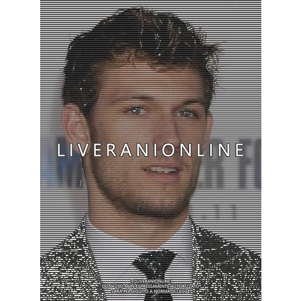 Alex Pettyfer Photo by Gilbert Flores \'I Am Number Four\' World Premiere at the Village Theatre February 9, 2011 - Westwood, California AG. ALDO LIVERANI SAS ITALY ONLY