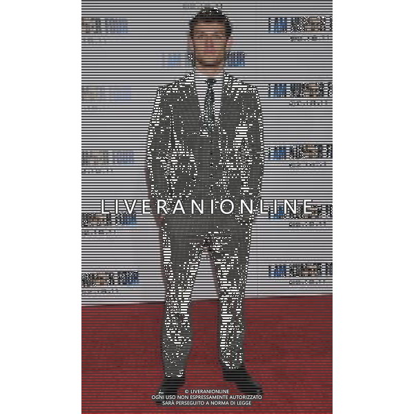 Alex Pettyfer Photo by Gilbert Flores \'I Am Number Four\' World Premiere at the Village Theatre February 9, 2011 - Westwood, California AG. ALDO LIVERANI SAS ITALY ONLY