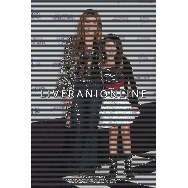 8 February 2011 - Los Angeles, California - Miley Cyrus and Noah Cyrus. \'Justin Bieber: Never Say Never\' Los Angeles Premiere held at Nokia Theater L.A. Live. Photo Credit: Byron Purvis/AdMedia AG. ALDO LIVERANI SAS ITALY ONLY *** Local Caption ***