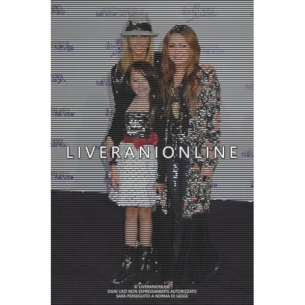 8 February 2011 - Los Angeles, California - Leticia Cyrus, Miley Cyrus and Noah Cyrus. \'Justin Bieber: Never Say Never\' Los Angeles Premiere held at Nokia Theater L.A. Live. Photo Credit: Byron Purvis/AdMedia AG. ALDO LIVERANI SAS ITALY ONLY *** Local Caption ***