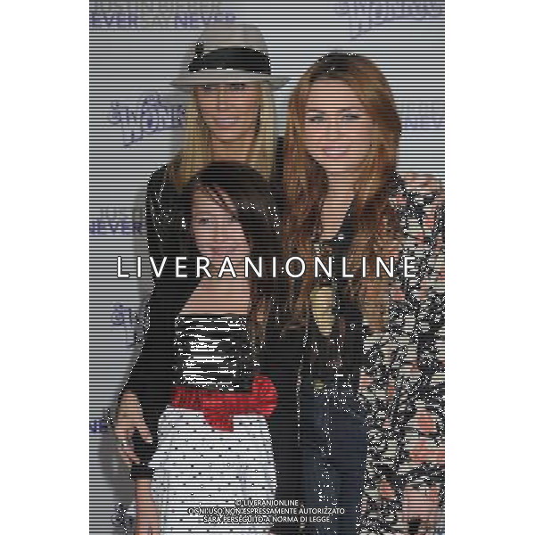 8 February 2011 - Los Angeles, California - Leticia Cyrus, Miley Cyrus and Noah Cyrus. \'Justin Bieber: Never Say Never\' Los Angeles Premiere held at Nokia Theater L.A. Live. Photo Credit: Byron Purvis/AdMedia AG. ALDO LIVERANI SAS ITALY ONLY *** Local Caption ***