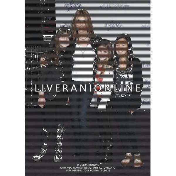 8 February 2011 - Los Angeles, California - Lori Loughlin and guests. \'Justin Bieber: Never Say Never\' Los Angeles Premiere held at Nokia Theater L.A. Live. Photo Credit: Byron Purvis/AdMedia AG. ALDO LIVERANI SAS ITALY ONLY *** Local Caption ***