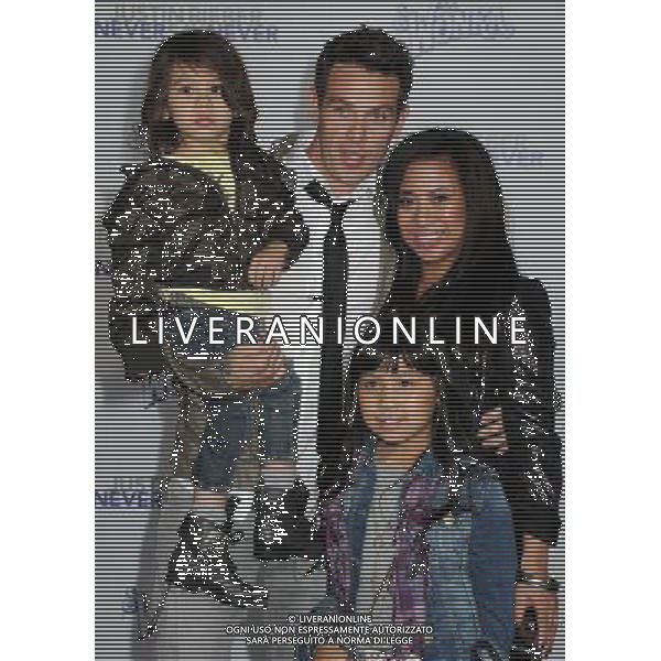 8 February 2011 - Los Angeles, California - Kevin Alejandro and family. \'Justin Bieber: Never Say Never\' Los Angeles Premiere held at Nokia Theater L.A. Live. Photo Credit: Byron Purvis/AdMedia AG. ALDO LIVERANI SAS ITALY ONLY *** Local Caption ***
