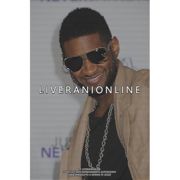 8 February 2011 - Los Angeles, California - Usher Raymond. \'Justin Bieber: Never Say Never\' Los Angeles Premiere held at Nokia Theater L.A. Live. Photo Credit: Byron Purvis/AdMedia AG. ALDO LIVERANI SAS ITALY ONLY *** Local Caption ***