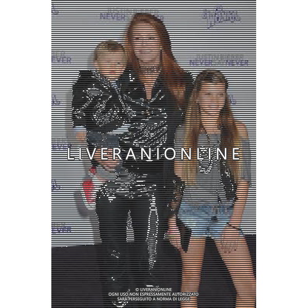 8 February 2011 - Los Angeles, California - Angie Everhart and children. \'Justin Bieber: Never Say Never\' Los Angeles Premiere held at Nokia Theater L.A. Live. Photo Credit: Byron Purvis/AdMedia AG. ALDO LIVERANI SAS ITALY ONLY *** Local Caption ***