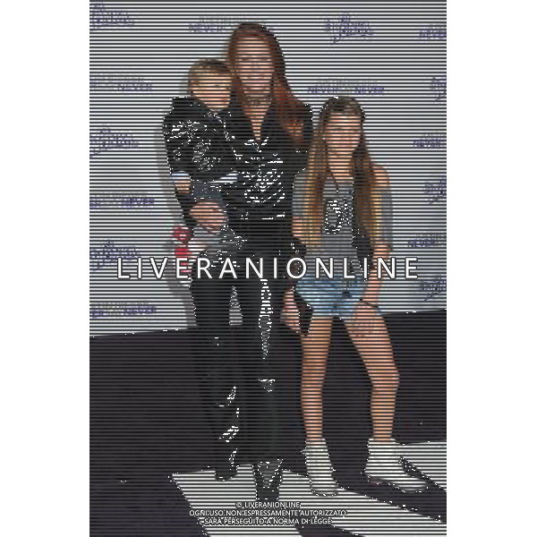 8 February 2011 - Los Angeles, California - Angie Everhart and children. \'Justin Bieber: Never Say Never\' Los Angeles Premiere held at Nokia Theater L.A. Live. Photo Credit: Byron Purvis/AdMedia AG. ALDO LIVERANI SAS ITALY ONLY *** Local Caption ***