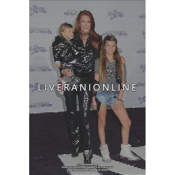 8 February 2011 - Los Angeles, California - Angie Everhart and children. \'Justin Bieber: Never Say Never\' Los Angeles Premiere held at Nokia Theater L.A. Live. Photo Credit: Byron Purvis/AdMedia AG. ALDO LIVERANI SAS ITALY ONLY *** Local Caption ***
