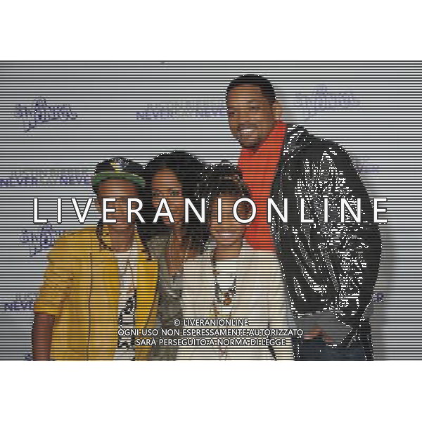 8 February 2011 - Los Angeles, California - Jaden Smith, Jada Pinkett Smith, Willow Smith and Will Smith. \'Justin Bieber: Never Say Never\' Los Angeles Premiere held at Nokia Theater L.A. Live. Photo Credit: Byron Purvis/AdMedia AG. ALDO LIVERANI SAS ITALY ONLY *** Local Caption ***