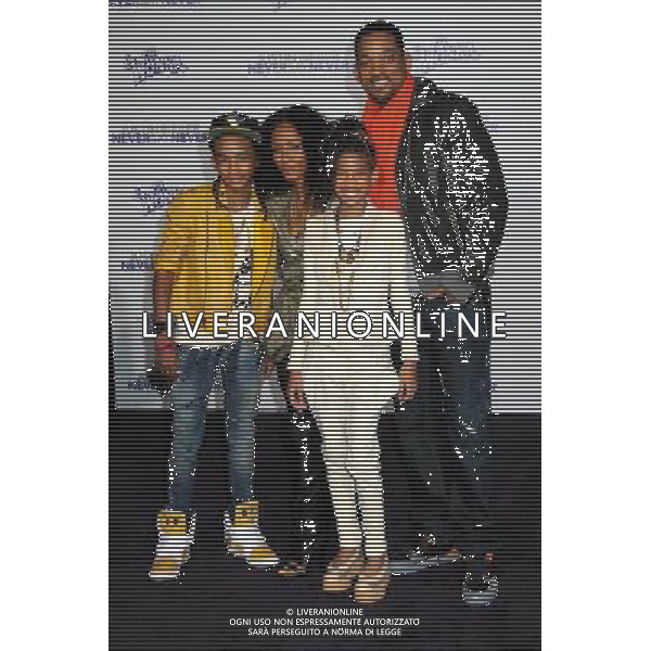 8 February 2011 - Los Angeles, California - Jaden Smith, Jada Pinkett Smith, Willow Smith and Will Smith. \'Justin Bieber: Never Say Never\' Los Angeles Premiere held at Nokia Theater L.A. Live. Photo Credit: Byron Purvis/AdMedia AG. ALDO LIVERANI SAS ITALY ONLY *** Local Caption ***