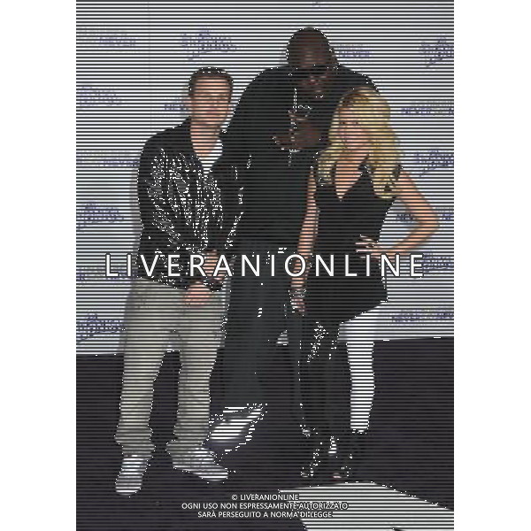 8 February 2011 - Los Angeles, California - Rob Dyrdek and Christopher Boykin (aka. \'Big Black\') and Chelsea Chanel Dudley. \'Justin Bieber: Never Say Never\' Los Angeles Premiere held at Nokia Theater L.A. Live. Photo Credit: Byron Purvis/AdMedia AG. ALDO LIVERANI SAS ITALY ONLY *** Local Caption ***