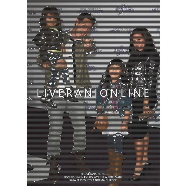 8 February 2011 - Los Angeles, California - Kevin Alejandro, Family. \'Justin Bieber: Never Say Never\' Los Angeles Premiere held At Nokia Theatre L.A Live. Photo Credit: Kevan Brooks/AdMedia AG. ALDO LIVERANI SAS ITALY ONLY *** Local Caption ***