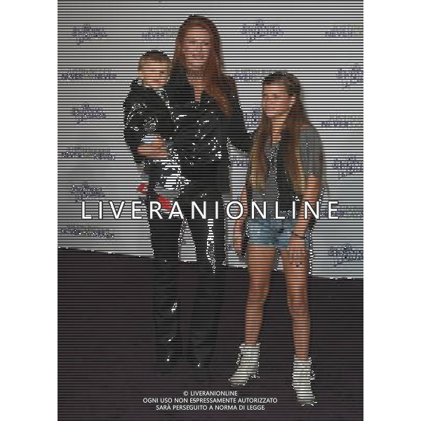 8 February 2011 - Los Angeles, California - Angie Everhart and Son Kayden. \'Justin Bieber: Never Say Never\' Los Angeles Premiere held At Nokia Theatre L.A Live. Photo Credit: Kevan Brooks/AdMedia AG. ALDO LIVERANI SAS ITALY ONLY *** Local Caption ***