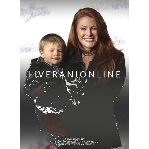 8 February 2011 - Los Angeles, California - Angie Everhart and Son Kayden. \'Justin Bieber: Never Say Never\' Los Angeles Premiere held At Nokia Theatre L.A Live. Photo Credit: Kevan Brooks/AdMedia AG. ALDO LIVERANI SAS ITALY ONLY *** Local Caption ***