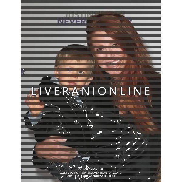 8 February 2011 - Los Angeles, California - Angie Everhart and Son Kayden. \'Justin Bieber: Never Say Never\' Los Angeles Premiere held At Nokia Theatre L.A Live. Photo Credit: Kevan Brooks/AdMedia AG. ALDO LIVERANI SAS ITALY ONLY *** Local Caption ***