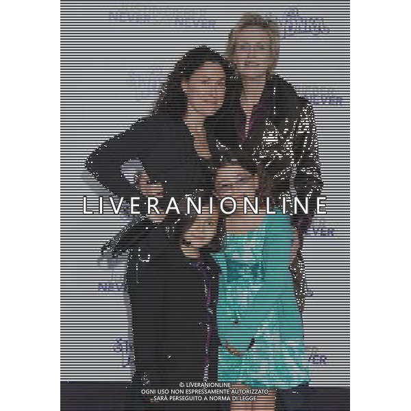 Jane Lynch and family Photo by Janet Gough \'Justin Bieber: Never Say Never\' Los Angeles Premiere at the Nokia Theater L.A. Live February 8, 2011 - Los Angeles, California AG. ALDO LIVERANI SAS ITALY ONLY *** Local Caption ***