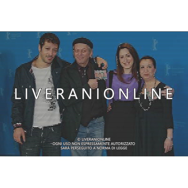 Actors Fahri Yardim, Vedat Erincin, Demet Guel and Lilay Huser during the photocall for \'Almanya-Willkommen in Deutschland / Welcome in Germany\' at the Berlinale 2011, 61. Internationale Filmfestspiele Berlin / 61st Berlin International Film Festival ITALY ONLY!!! AG ALDO LIVERANI