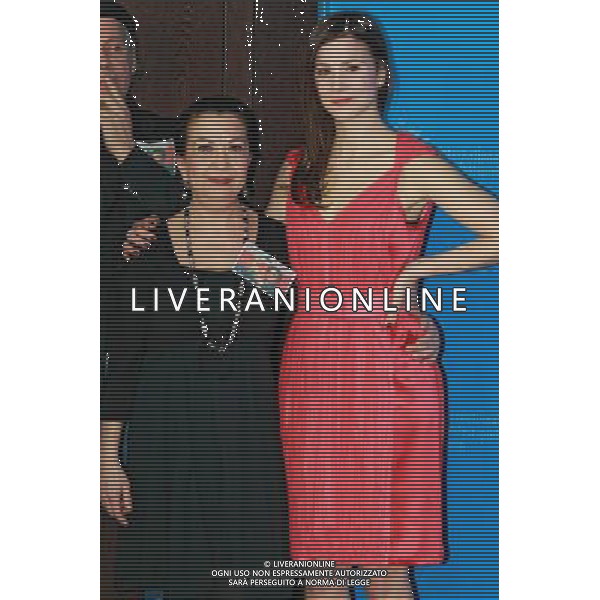 Actresses Lilay Huser and Aylin Tezel during the photocall for \'Almanya-Willkommen in Deutschland / Welcome in Germany\' at the Berlinale 2011, 61. Internationale Filmfestspiele Berlin / 61st Berlin International Film Festival FRANCE ONLY!!! AG ALDO LIVERANI