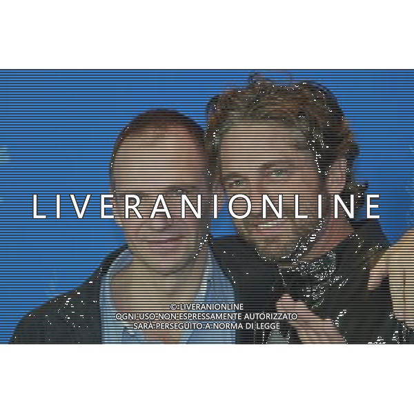 Actors Ralph Fiennes and Gerard Butler during the photocall for \'Coriolanus\' atBerlinale 2011 / 61st Berlin International Film Festival 14.02.2011 BERLIN 2011 FESTIWAL FILMOWY W BERLINIE PREMIERA FILMU FOT. FUTURE IMAGE/NEWSPIX.PL ITALY ONLY!!! --- Newspix.pl /AG ALDO LIVERANI CINEMA BERLINALE CINEMA FESTIVAL - ITALY ONLY - *** Local Caption *** .