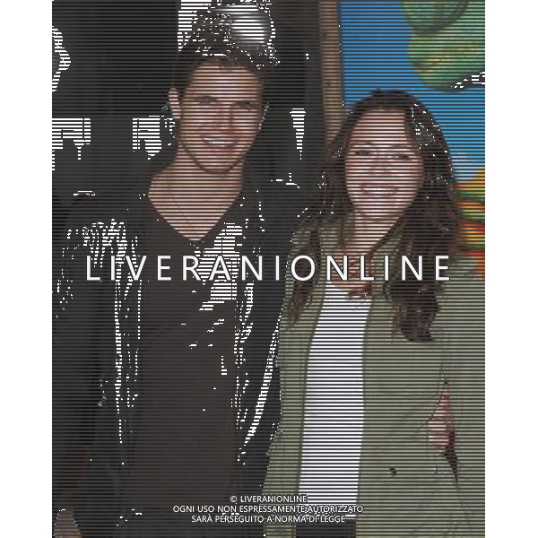 14 February 2011 - Westwood, California - Robbie Amell and Italia Ricci. \'Rango\' Los Angeles Premiere held At The Regency Village Theatre. Photo Credit: Kevan Brooks/AdMedia AG. ALDO LIVERANI SAS ITALY ONLY