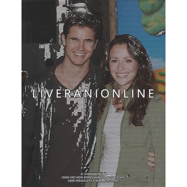 14 February 2011 - Westwood, California - Robbie Amell and Italia Ricci. \'Rango\' Los Angeles Premiere held At The Regency Village Theatre. Photo Credit: Kevan Brooks/AdMedia AG. ALDO LIVERANI SAS ITALY ONLY