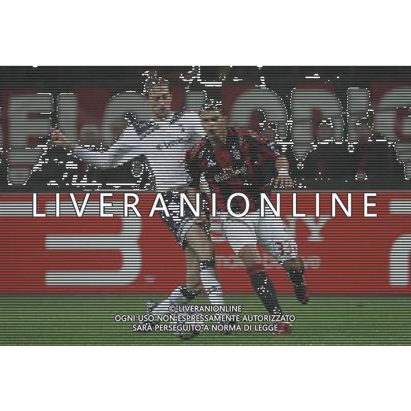 MILAN-TOTTENHAM HOTSPUR 15/02/2011 CHAMPIONS LEAGUE NELLA FOTO thiago silva e peter crouch FOTO MARCO LUZANI-AG ALDO LIVERANI 