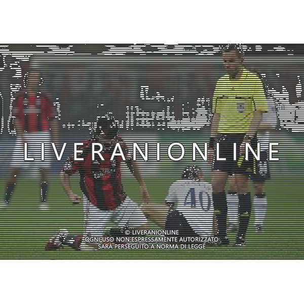MILAN-TOTTENHAM HOTSPUR 15/02/2011 CHAMPIONS LEAGUE NELLA FOTO la grinta di gattuso lo porta all\'ammonizione da parte di lannoy FOTO MARCO LUZZANI-AG ALDO LIVERANI 