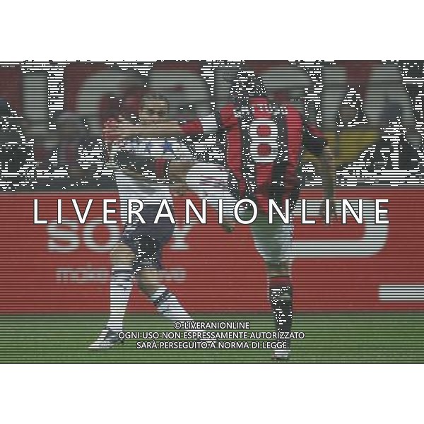 Milano 15-02-2011 Champions League 2010/11 milan-tottenham 0:1 nella foto benoit assou-ekotto e gennaro gattuso ph marco luzzani/ag aldo liverani s.a.s.