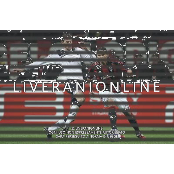 Milano 15-02-2011 Champions League 2010/11 milan-tottenham 0:1 nella foto thiago silva e peter crouch ph marco luzzani/ag aldo liverani s.a.s.