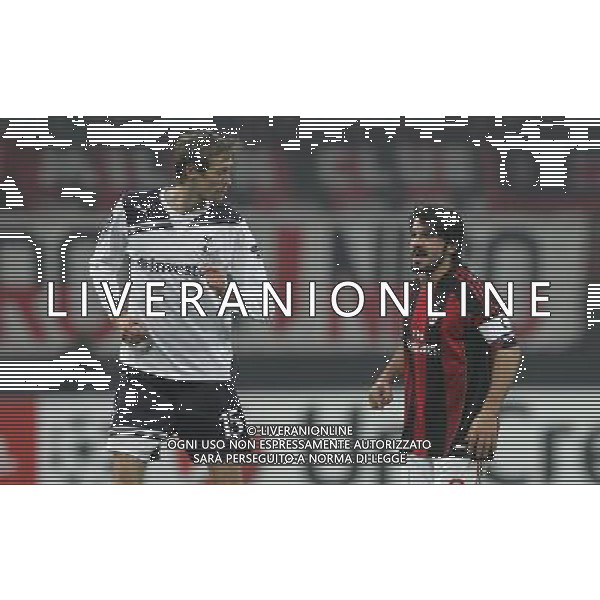 Milano 15-02-2011 Champions League 2010/11 milan-tottenham 0:1 nella foto gennaro gattuso e peter crouch ph marco luzzani/ag aldo liverani s.a.s.