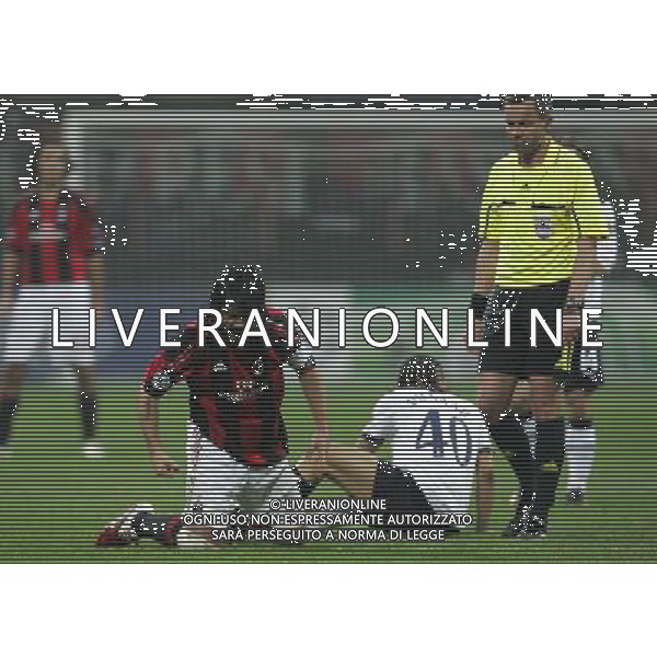 Milano 15-02-2011 Champions League 2010/11 milan-tottenham 0:1 nella foto gennaro gattuso interviene su steven pienaar intervento che gli costa l\'ammonizione ph marco luzzani/ag aldo liverani s.a.s.