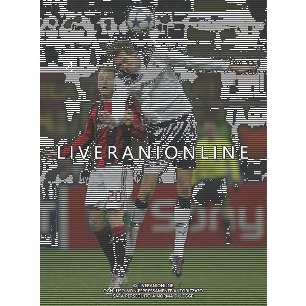Milano 15-02-2011 Champions League 2010/11 milan-tottenham 0:1 nella foto ignazio abate e peter crouch ph marco luzzani/ag aldo liverani s.a.s.
