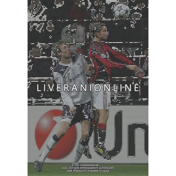 Milano 15-02-2011 Champions League 2010/11 milan-tottenham 0:1 nella foto luca antonini e peter crouch ph marco luzzani/ag aldo liverani s.a.s.