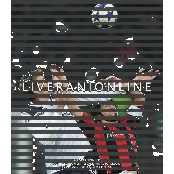 UEFA Champions League 2010/2011 Round of 16 Milano - 15.02.2011 Milan-Tottenham Nella Foto:Peter Crouch-Rino Gattuso /Ph.Vitez-Ag. Aldo Liverani